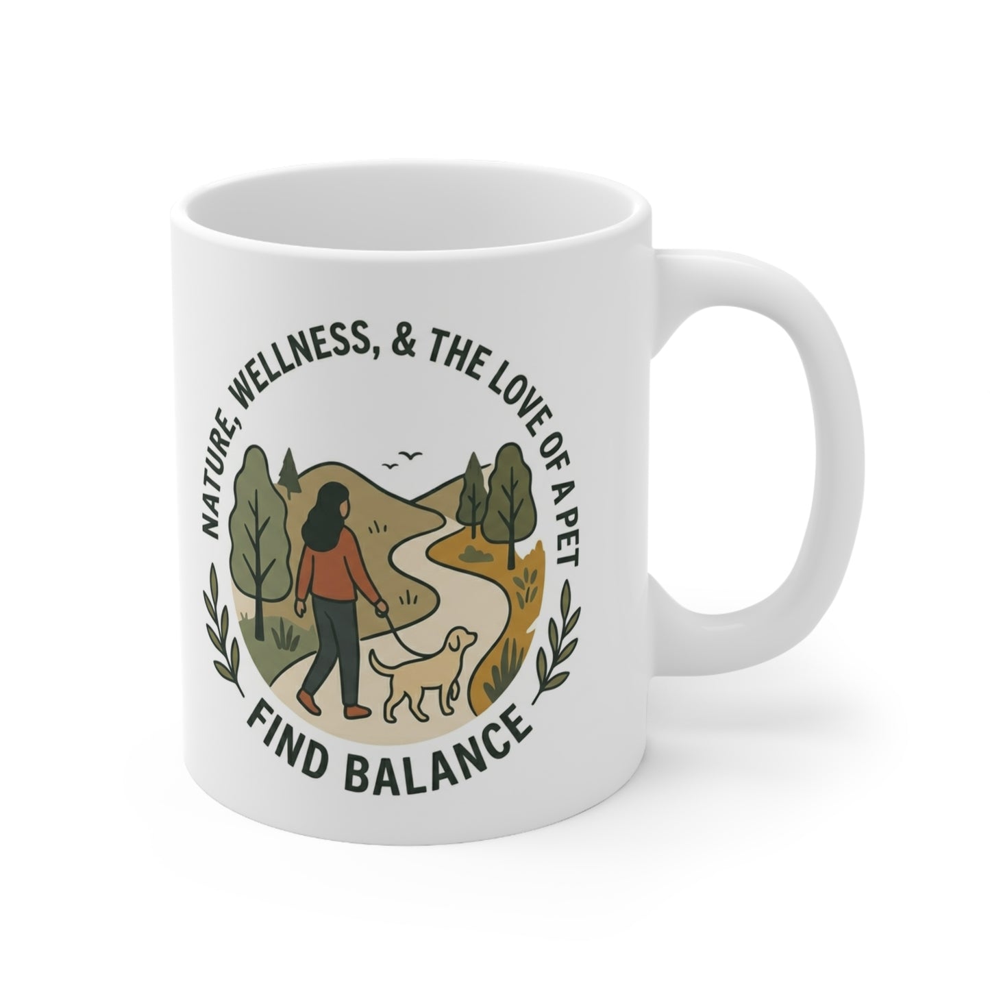 White mug with a design of a person walking a dog on a trail, surrounded by nature, with text 'Nature, Wellness, & The Love of a Pet Find Balance'.