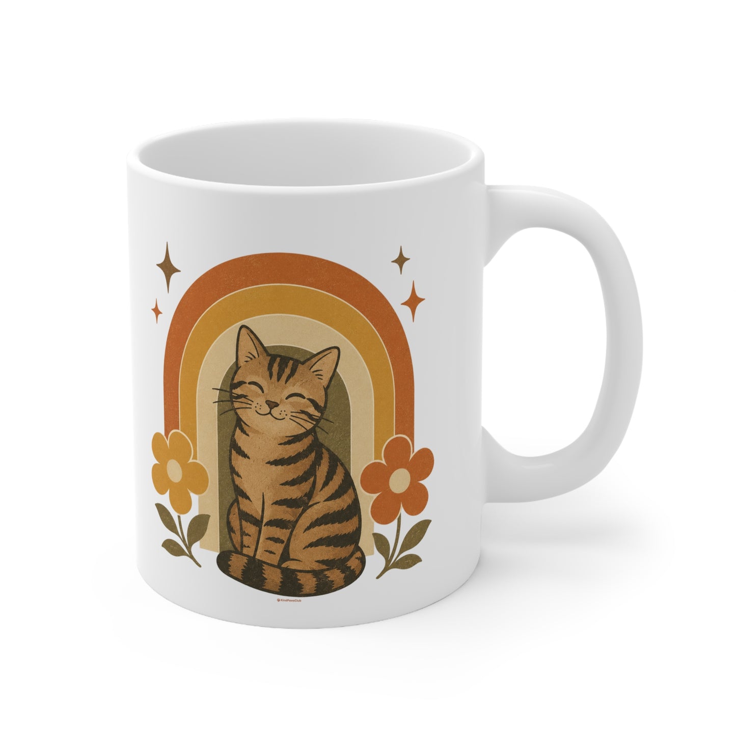 White mug with a cat illustration and floral design on a white background