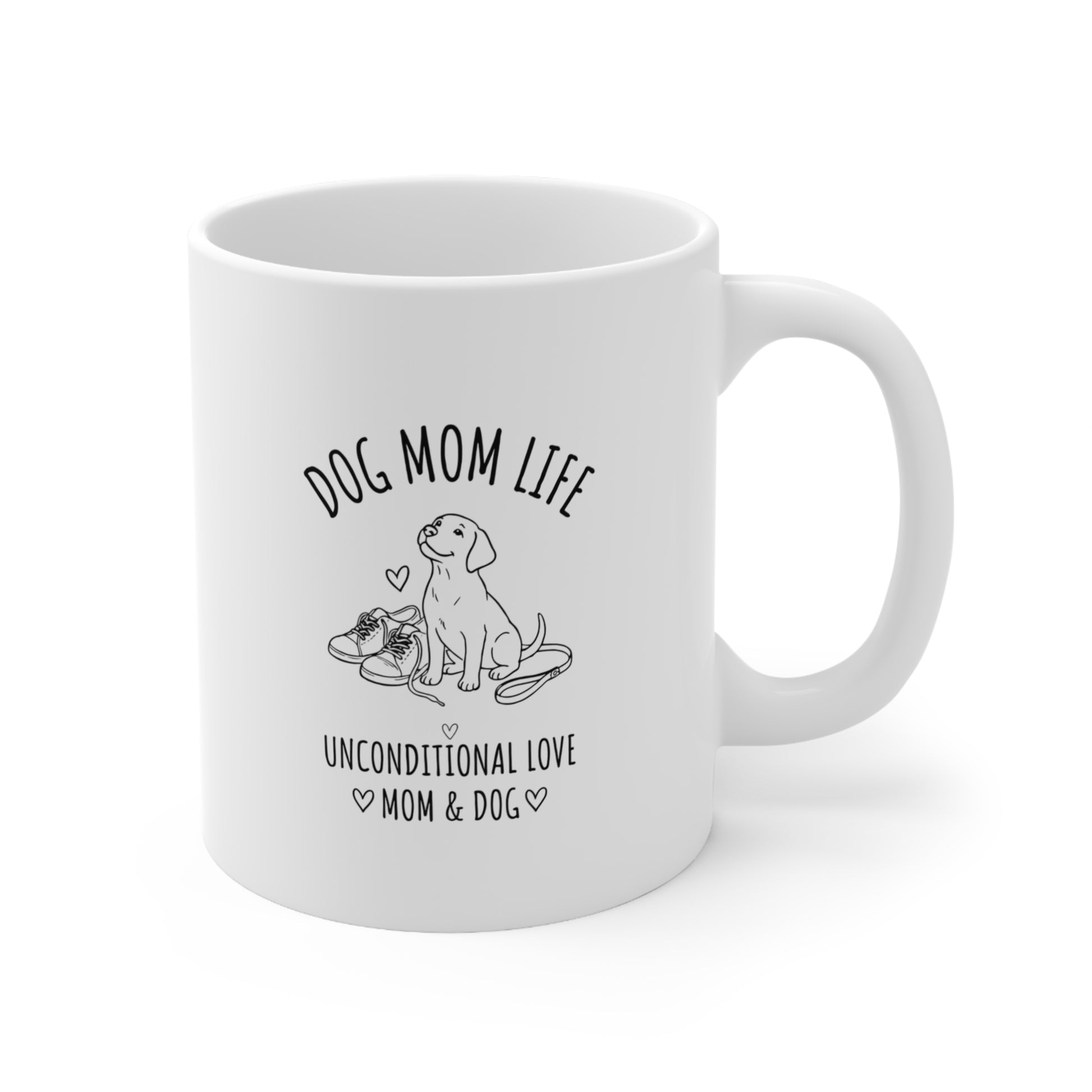 White mug with black text and a dog illustration on a white background