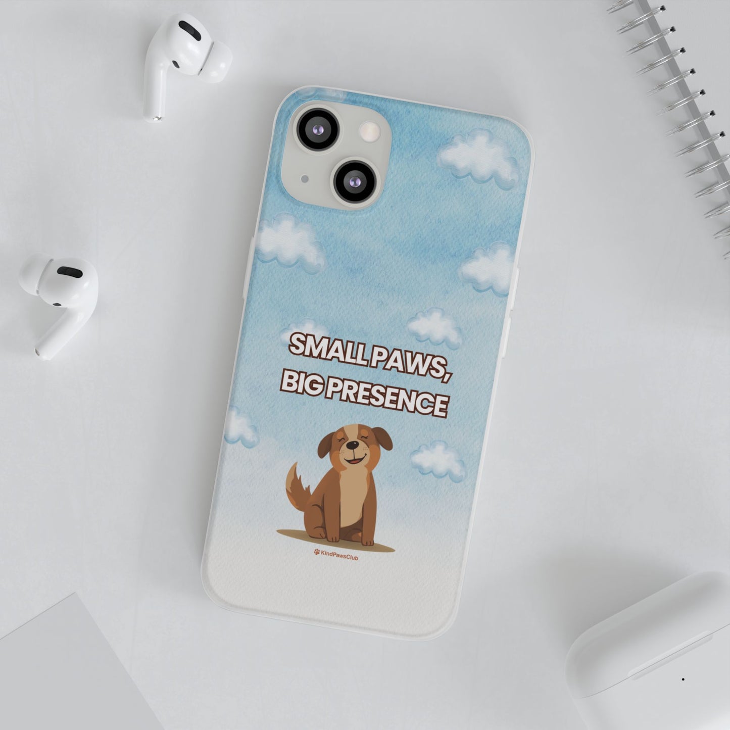 Phone case with a dog illustration and text 'Small Paws, Big Presence' on a white surface.